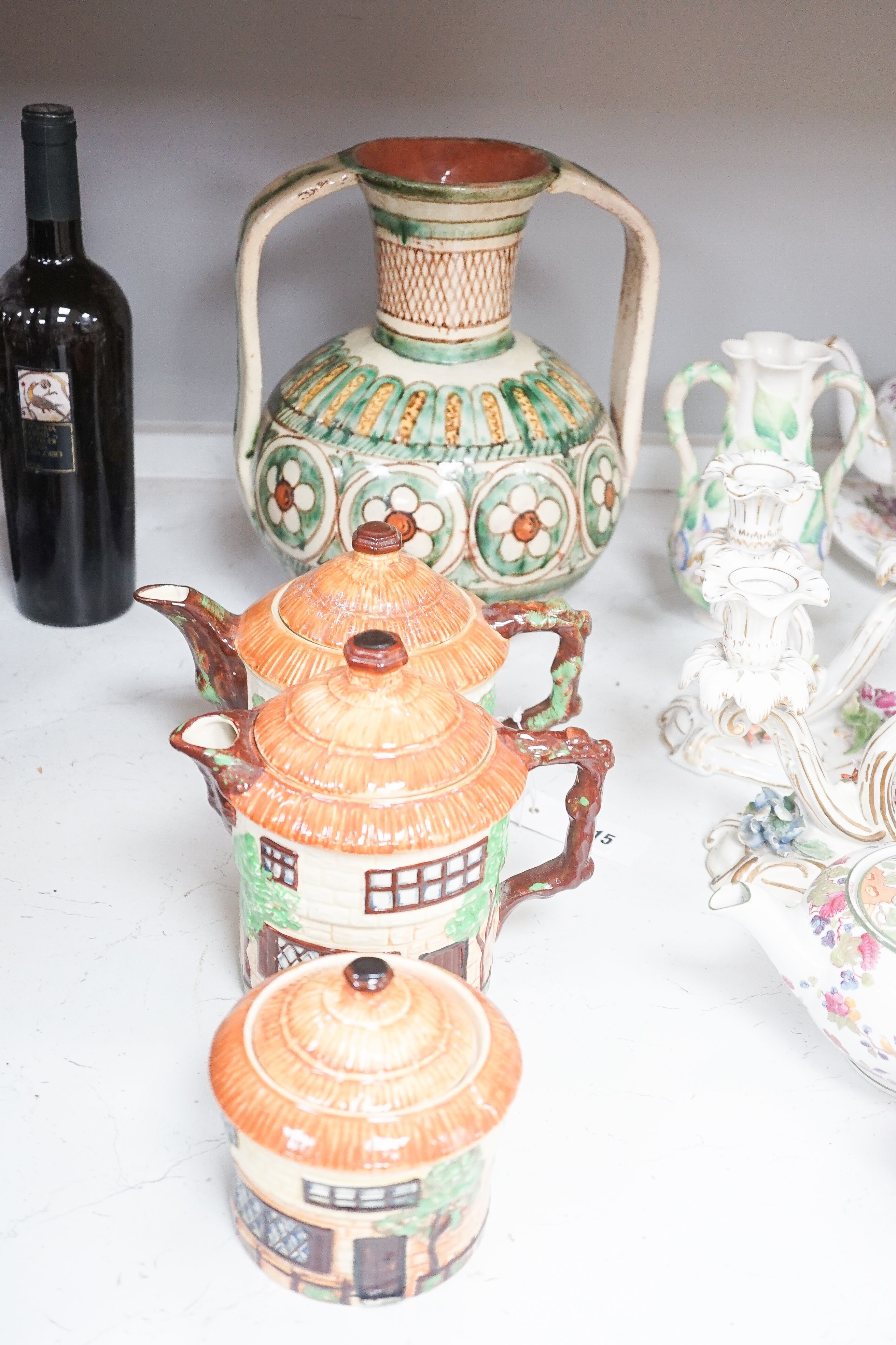 A Crown Staffordshire fifty nine piece part tea set and dessert service, central flowers and gilt borders, a Paragon part tea set and other ceramics